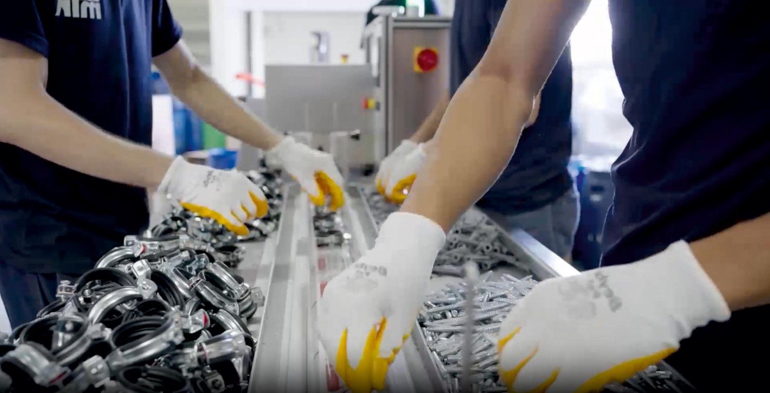 Efficient pipe clamp assembly process at MTK Pipe Clamps with skilled workforce and automated quality control for global projects
